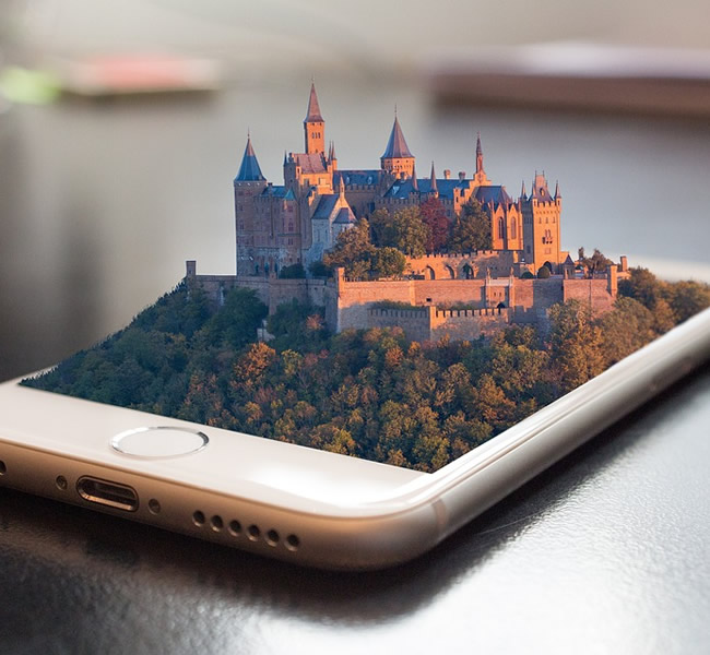3D castle rising out of a cell phone