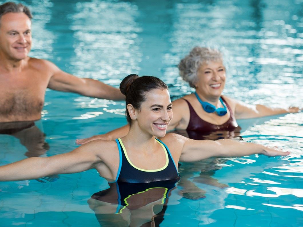 Participants in a water fitness class